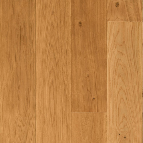 Close-up of Natural Oak wideboard timber flooring showing warm honey tones and a smooth, non-reflective matte finish.