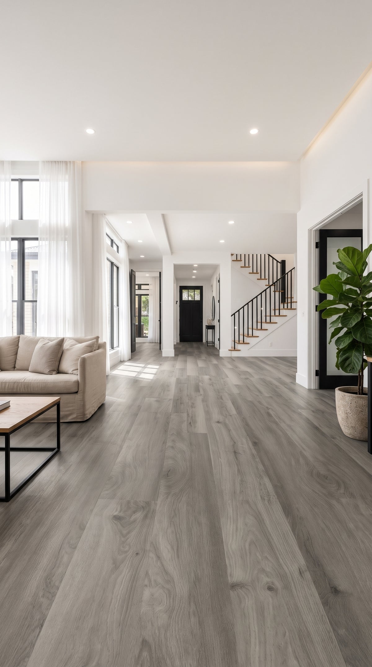 Olympus vinyl plank flooring with a textured matte finish, micro-bevel edges, and a realistic oak wood grain pattern.