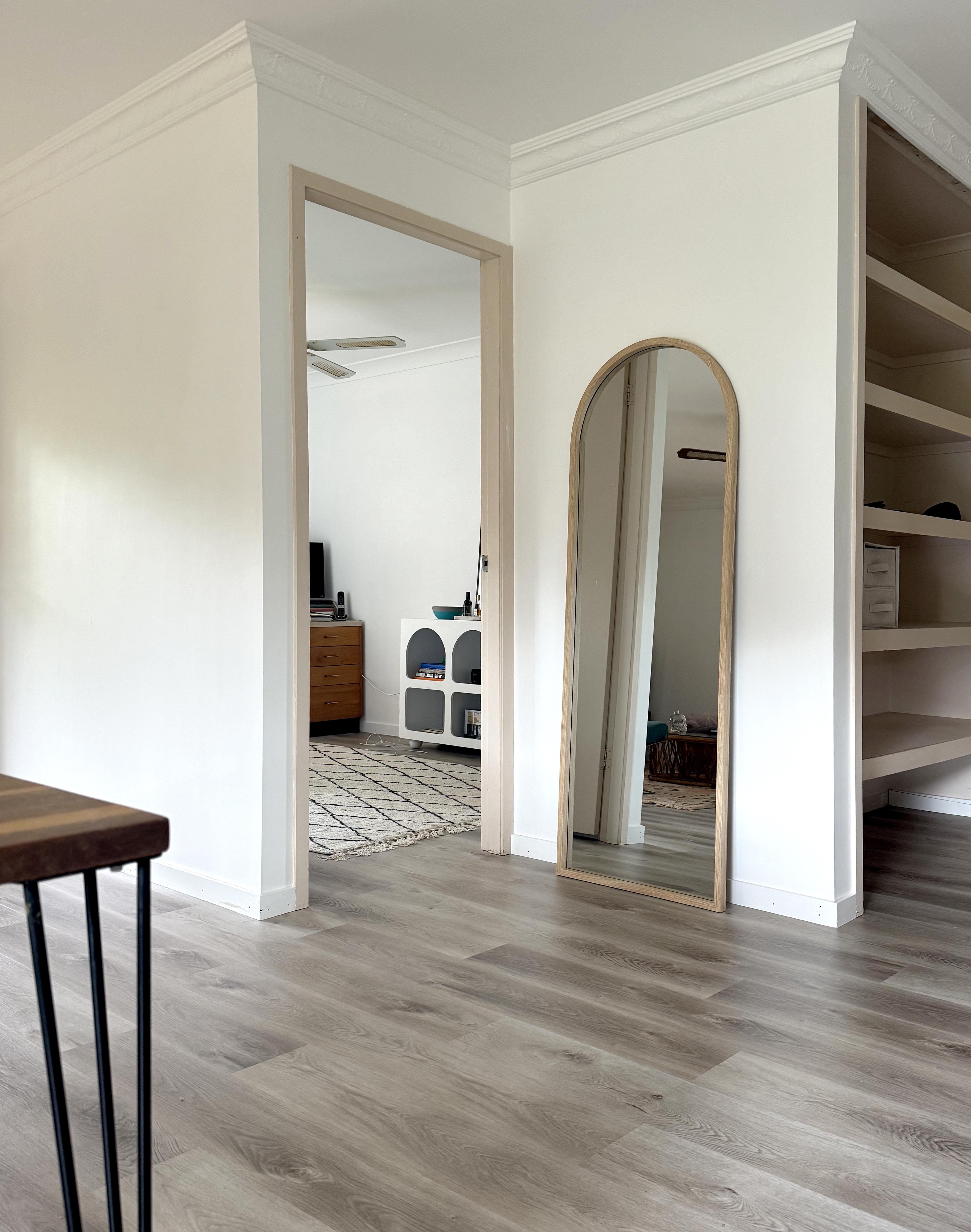 Wide-plank Airlie Hybrid flooring. Matte light oak texture with realistic wood grain and micro-beveled edges.