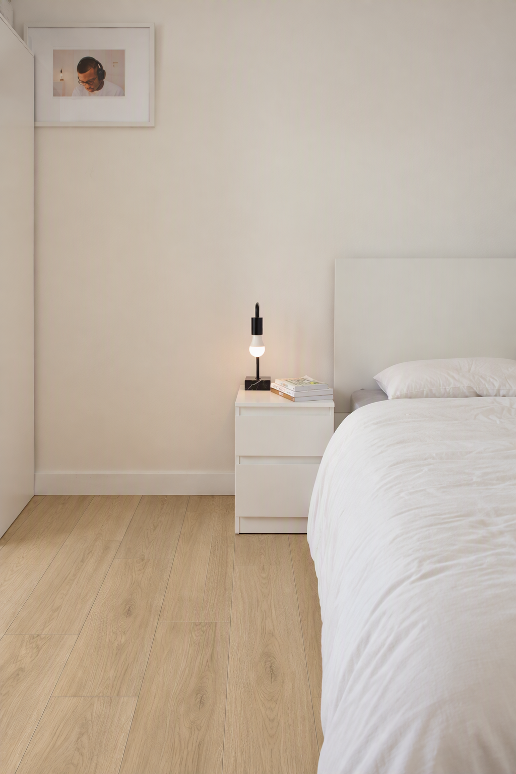 Winter Maple hybrid, smooth matte. Durable waterproof planks with a light ashy-blonde finish and authentic wood texture.
